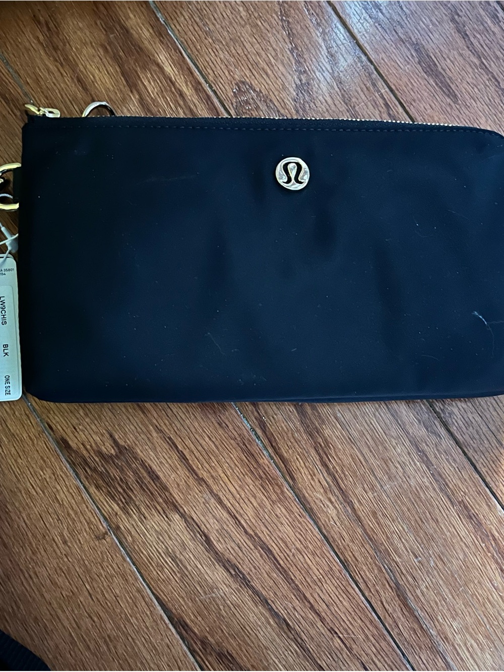 lululemon athletica Black Wristlet Pouch with Gold Logo Accent